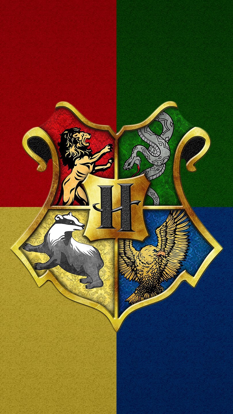 Wallpaper Harry Potter Badges: Gryffindor, Slytherin, Hufflepuff and Ravenclaw Vertical