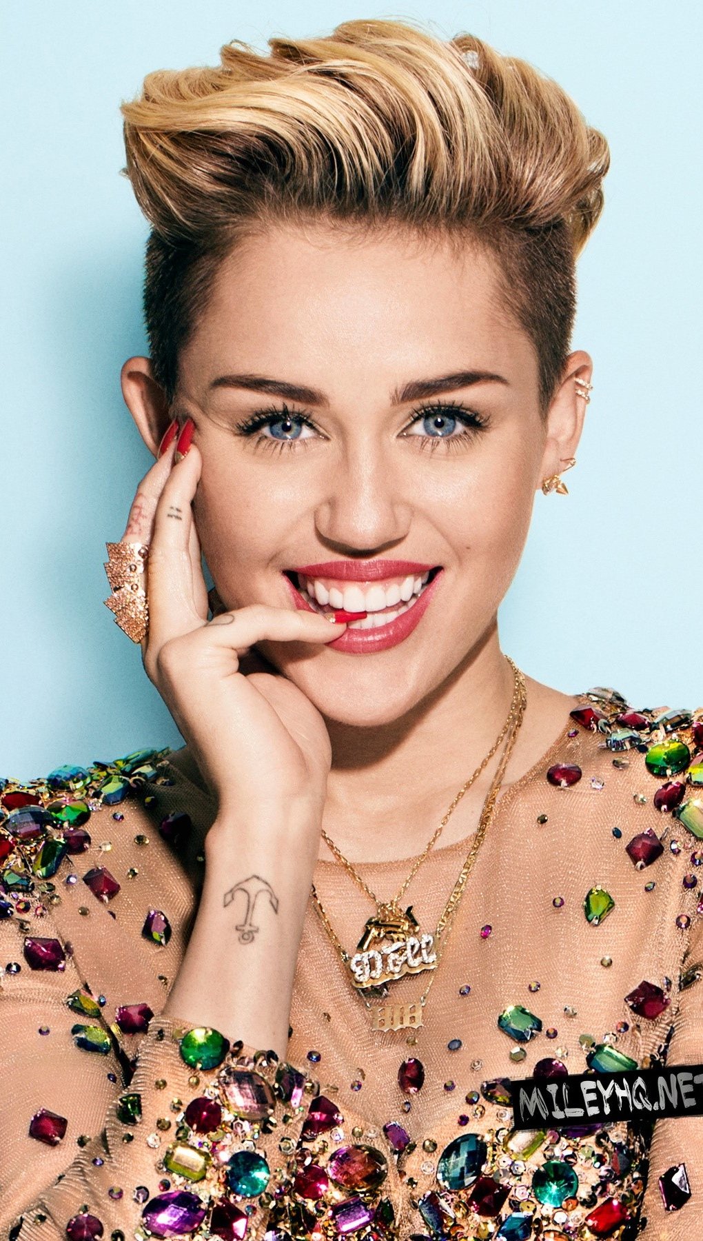 Fondos de pantalla Miley Cyrus rubia Vertical